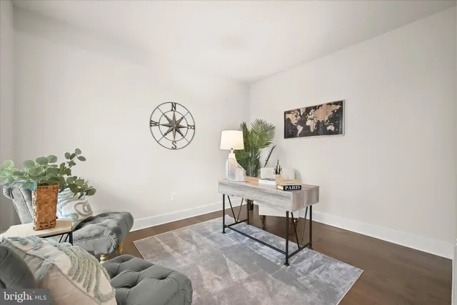 a workspace with furniture and a window