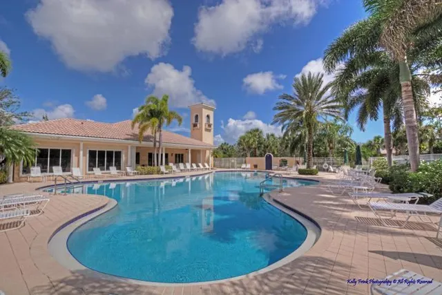 a view of a house with swimming pool