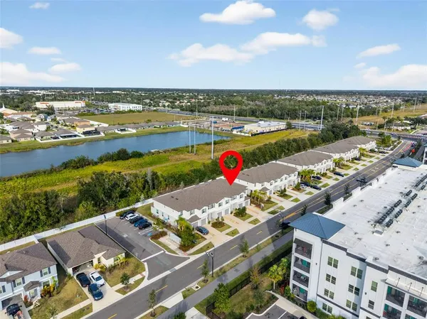 a view of an entryway and livingroom
