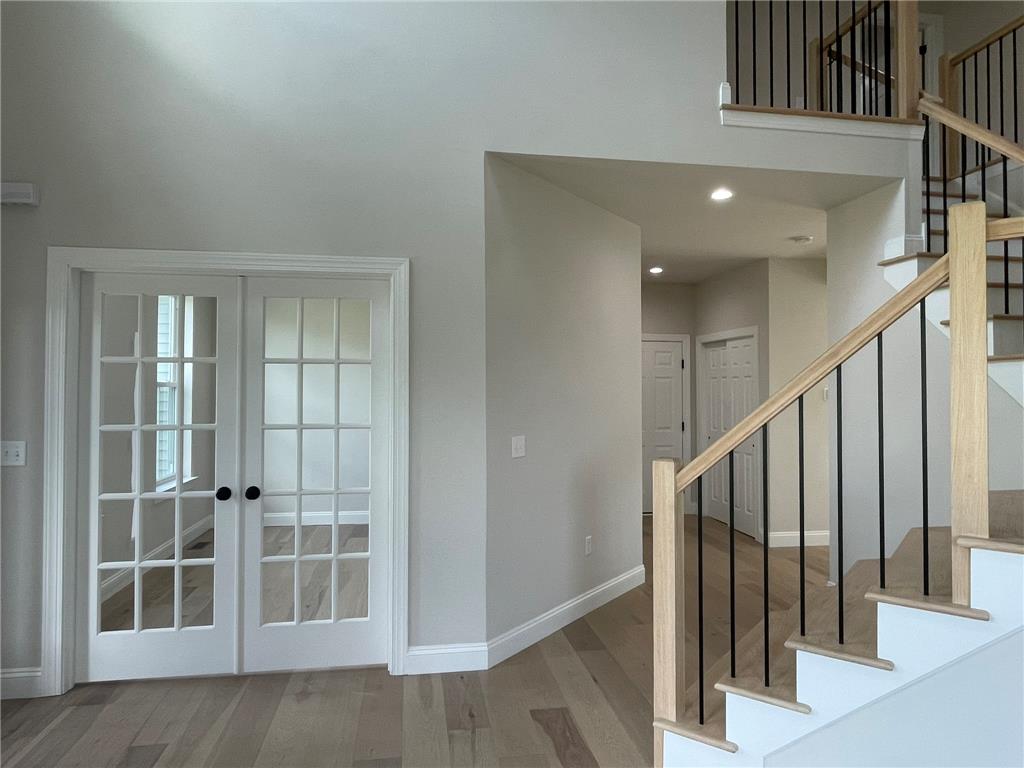 5043 Chapmans Road Orefield, PA 18069 - Photo 8 of 30 Elegant French doors and a modern staircase create an inviting entry.