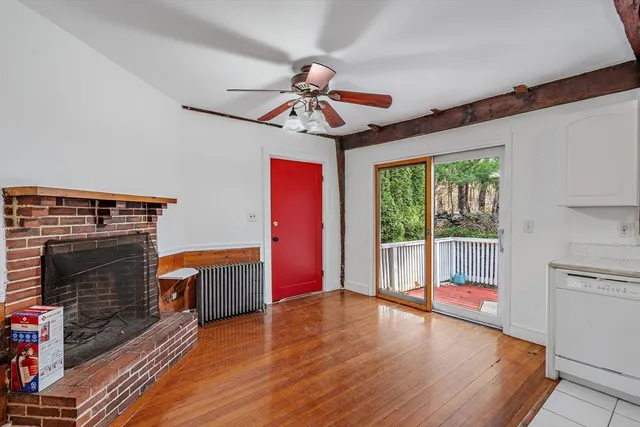 a view of livingroom with furniture wooden floor and windows
