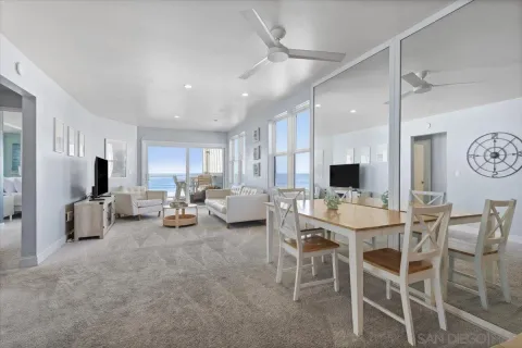 a kitchen with stainless steel appliances kitchen island granite countertop a sink stove and cabinets