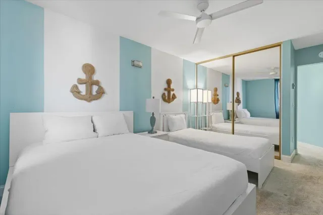 a view of a kitchen with a sink and cabinets