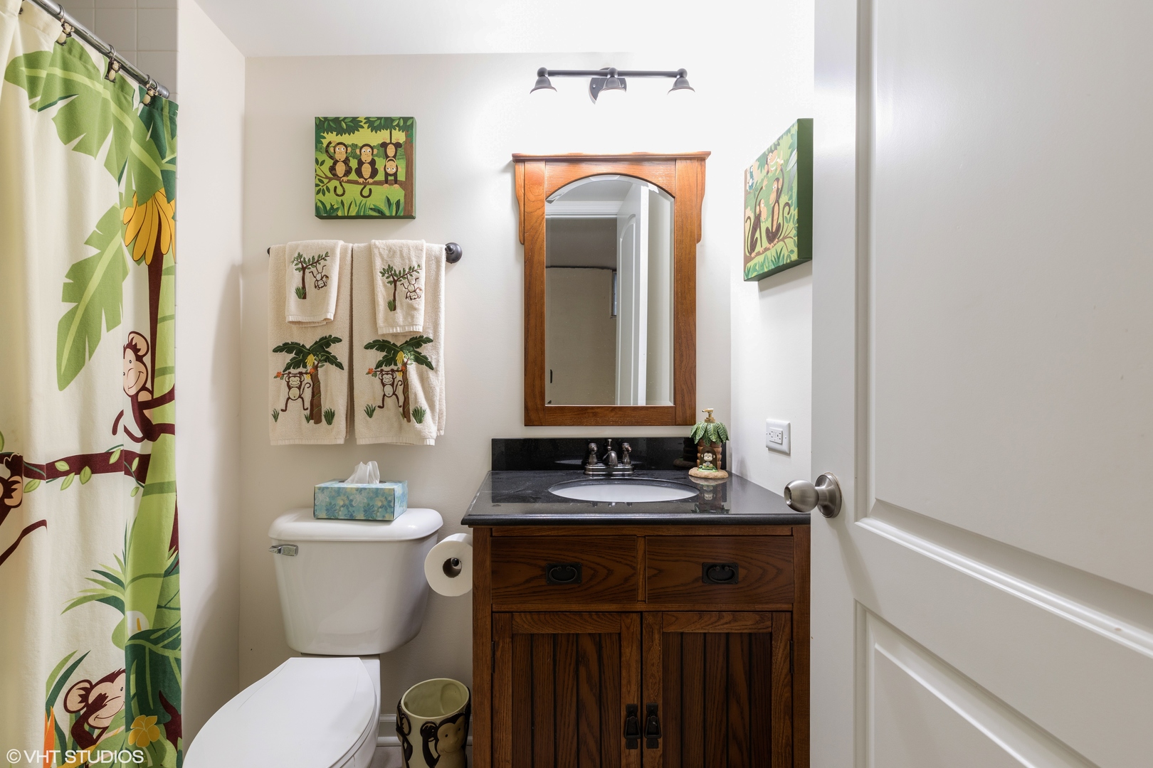1329 Olive Road Homewood, IL 60430 - Photo 12 of 17 a bathroom with a toilet sink and mirror