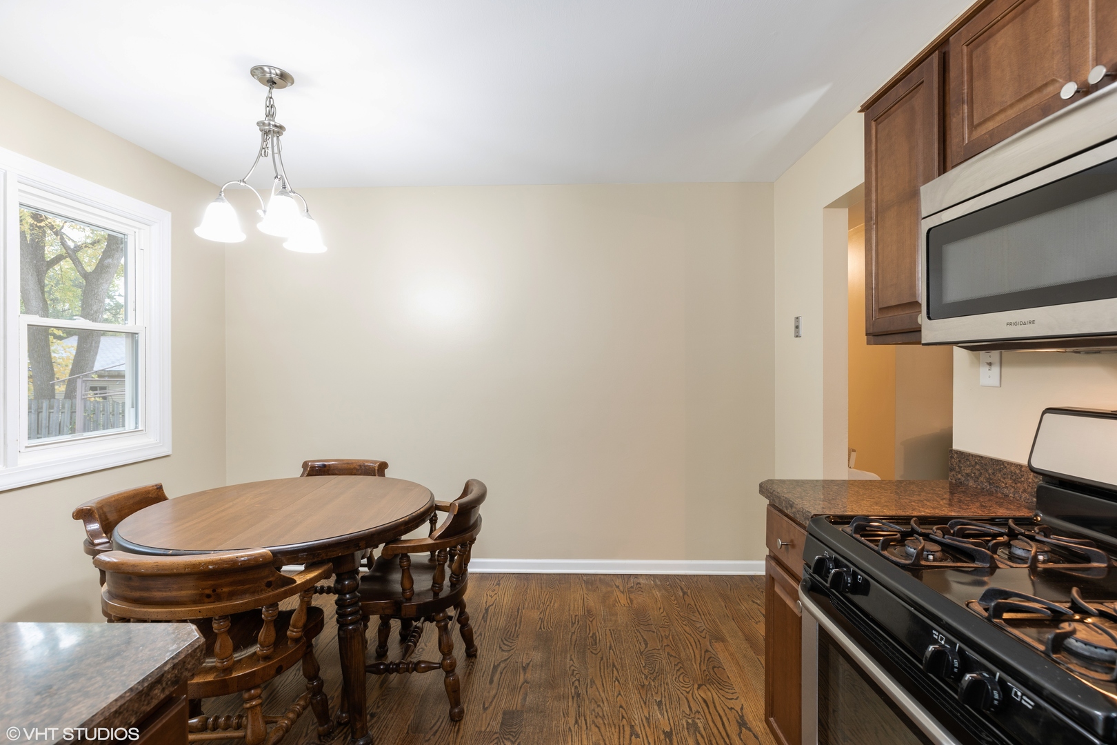 1329 Olive Road Homewood, IL 60430 - Photo 4 of 17 a kitchen with a stove and a microwave