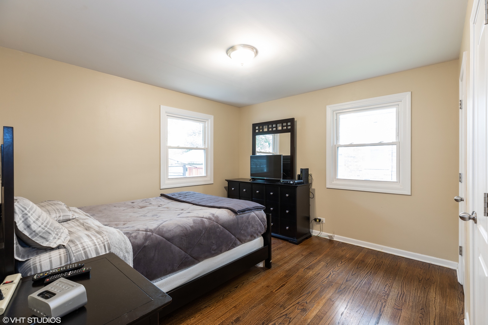 1329 Olive Road Homewood, IL 60430 - Photo 7 of 17 a bedroom with a bed and wooden floor