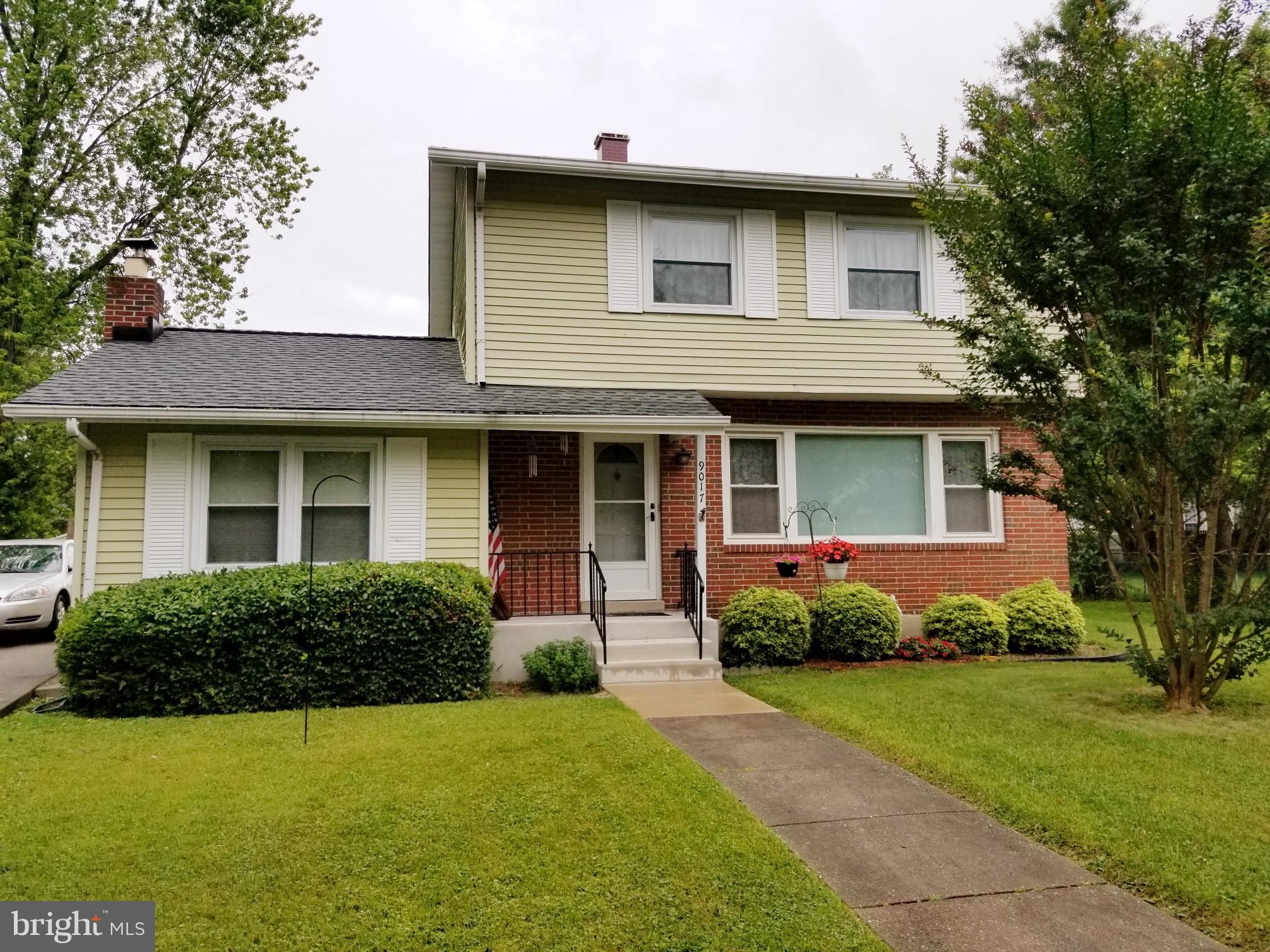 9017 Tammy Road Baltimore, MD 21236 - Photo 2 of 23 a front view of a house with garden
