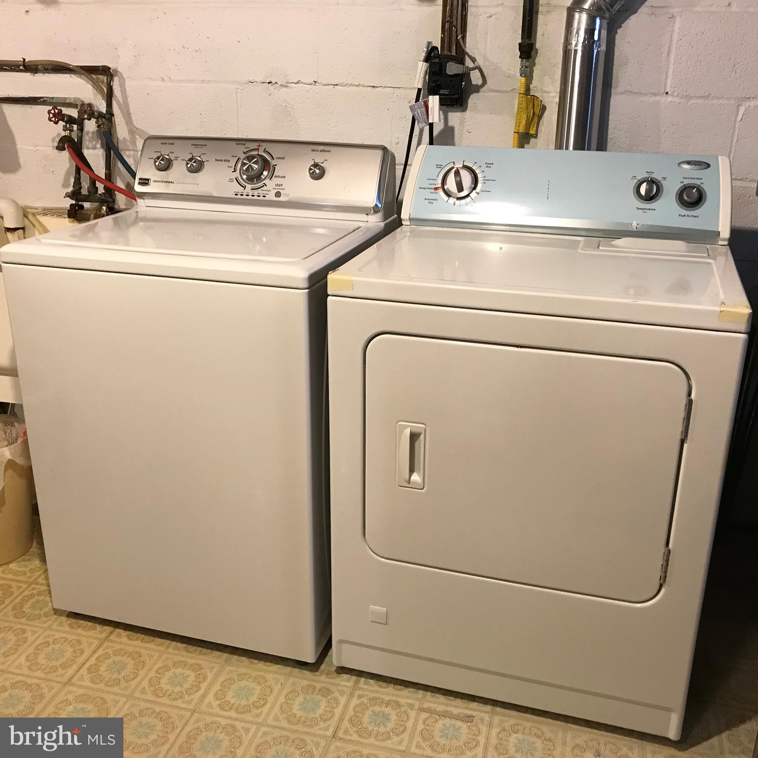 9017 Tammy Road Baltimore, MD 21236 - Photo 22 of 23 a utility room with dryer and washer