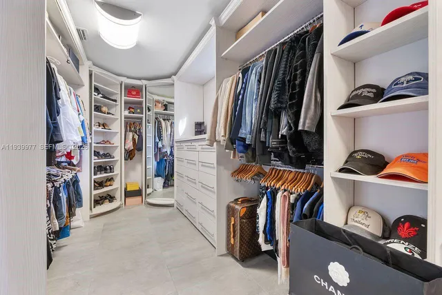 a bathroom with a toilet a sink and a mirror