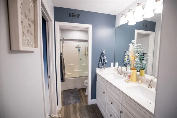 a bedroom with a bed and furniture