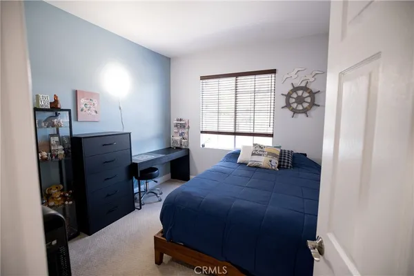 a front view of a house with large windows