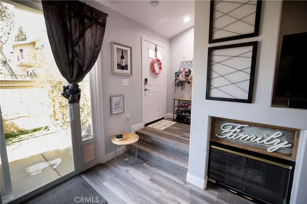 a bathroom with a sink vanity mirror and toilet