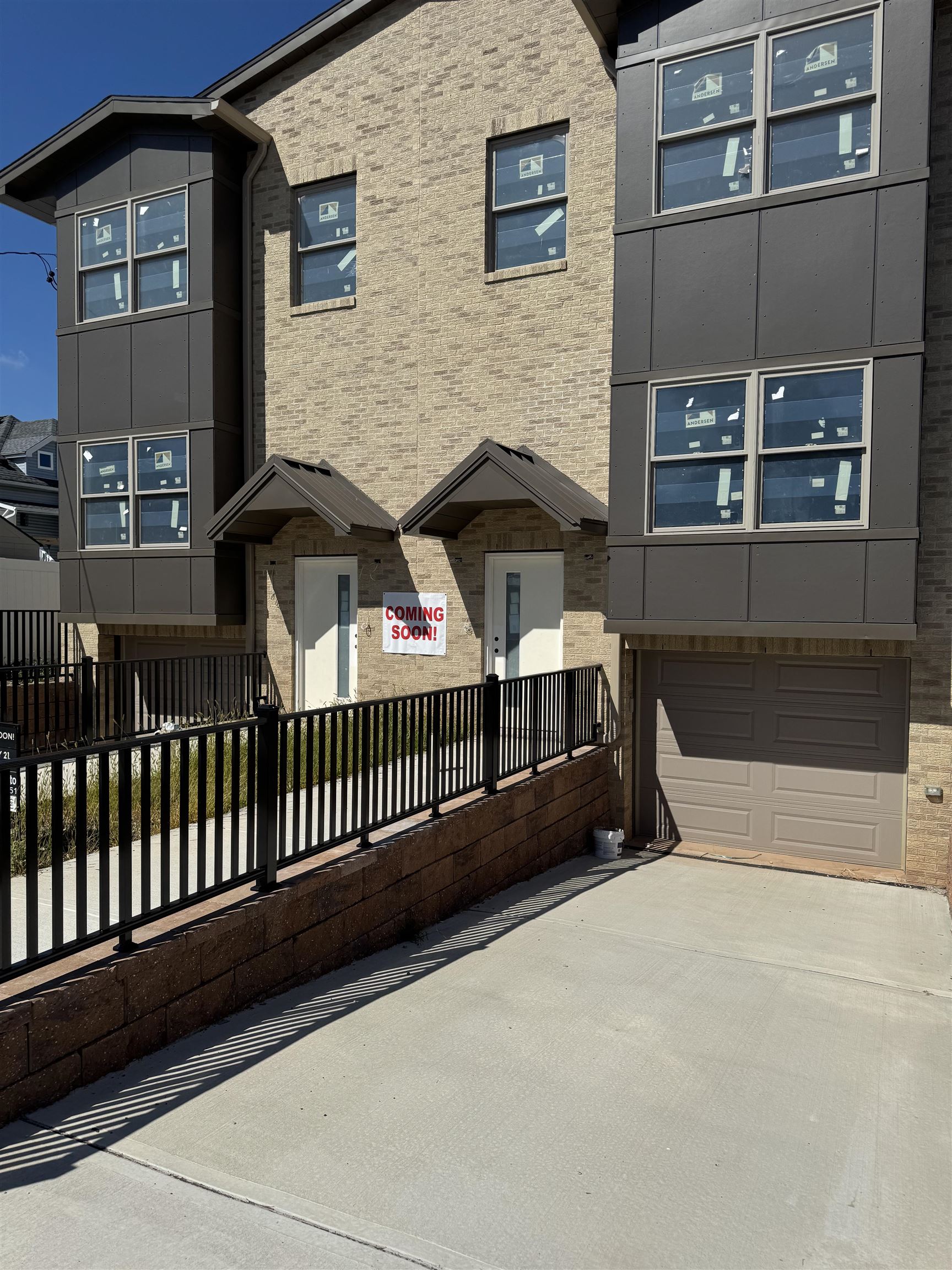 a view of front door and small yard
