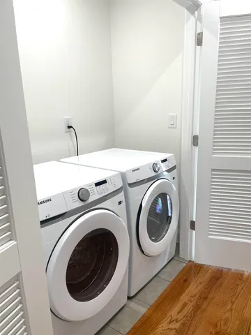 a utility room with dryer and washer