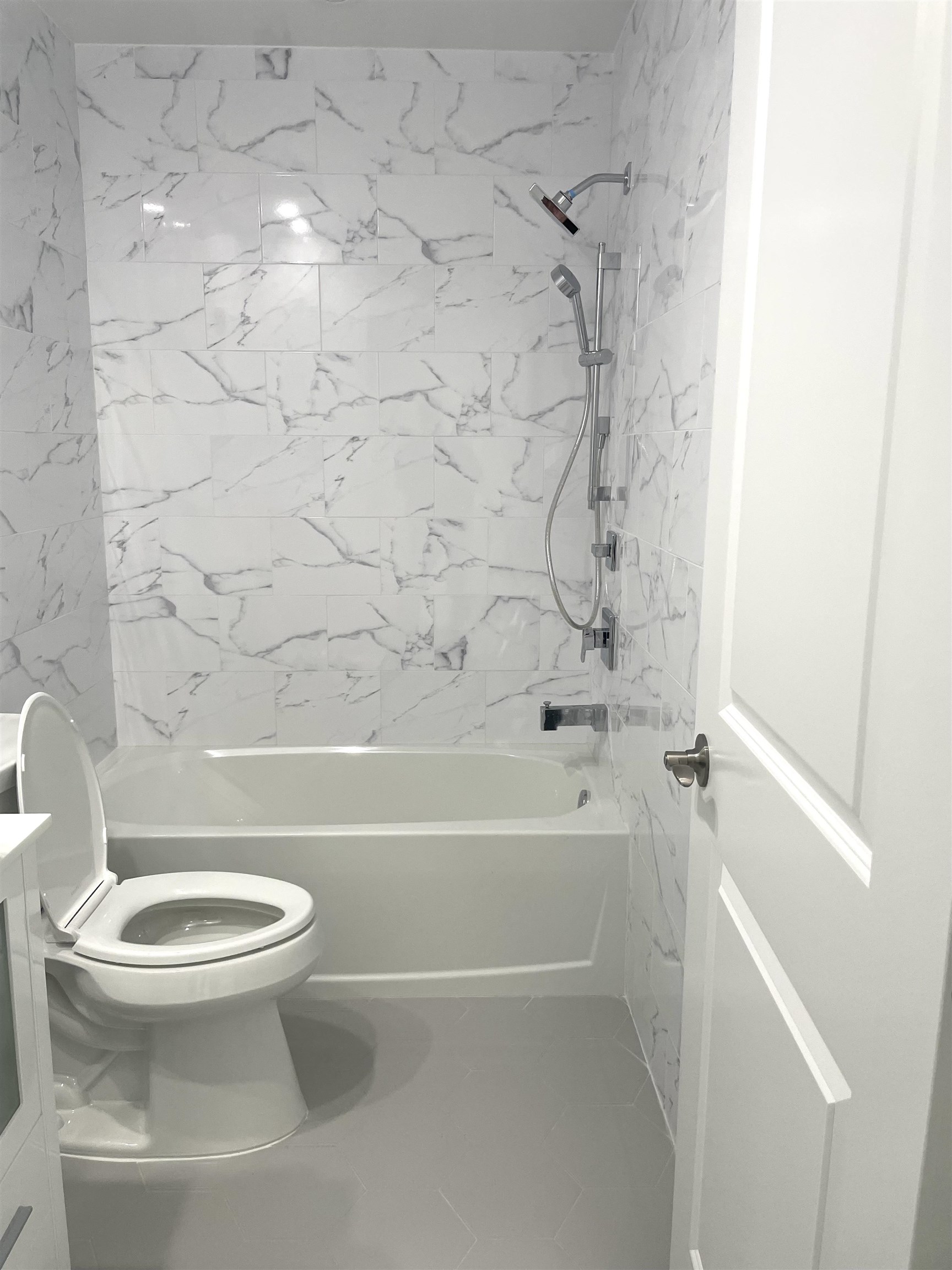 761 B 4th Street, Unit B Secaucus, NJ 07094 - Photo 3 of 34 a bathroom with a toilet and a shower