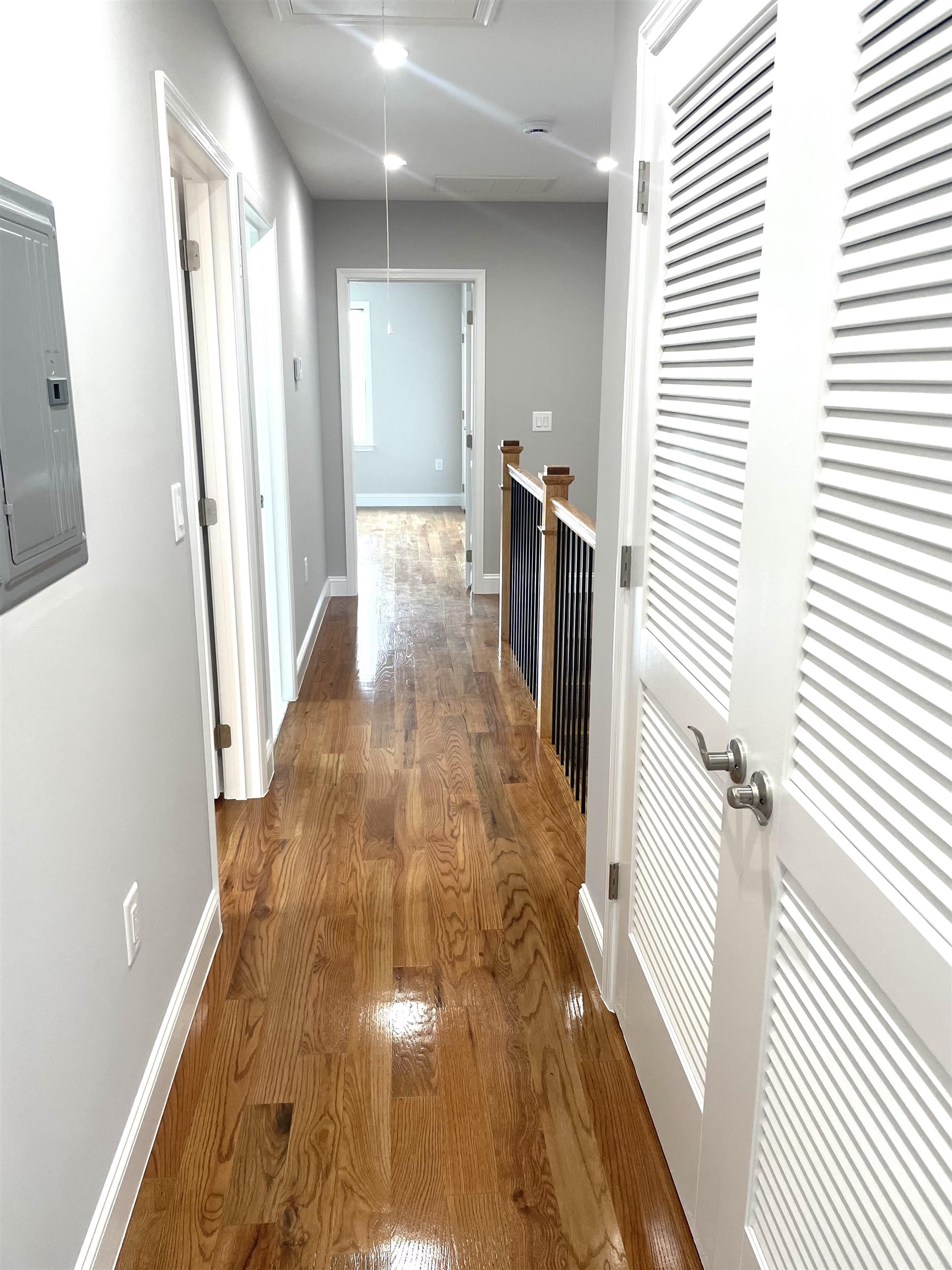 761 B 4th Street, Unit B Secaucus, NJ 07094 - Photo 33 of 34 a view of a hallway with wooden floor and staircase