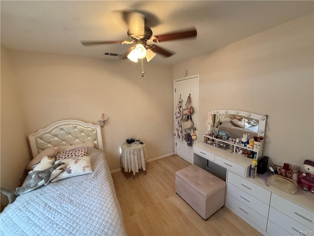 21275 Pocomoke Road Apple Valley, CA 92308 - Photo 24 of 40 a living room with furniture and white walls