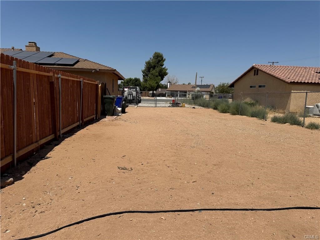 21275 Pocomoke Road Apple Valley, CA 92308 - Photo 37 of 40 a view of a house with a snow in the background