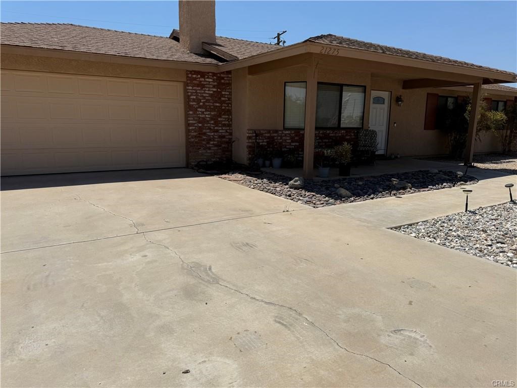 21275 Pocomoke Road Apple Valley, CA 92308 - Photo 40 of 40 a front view of a house