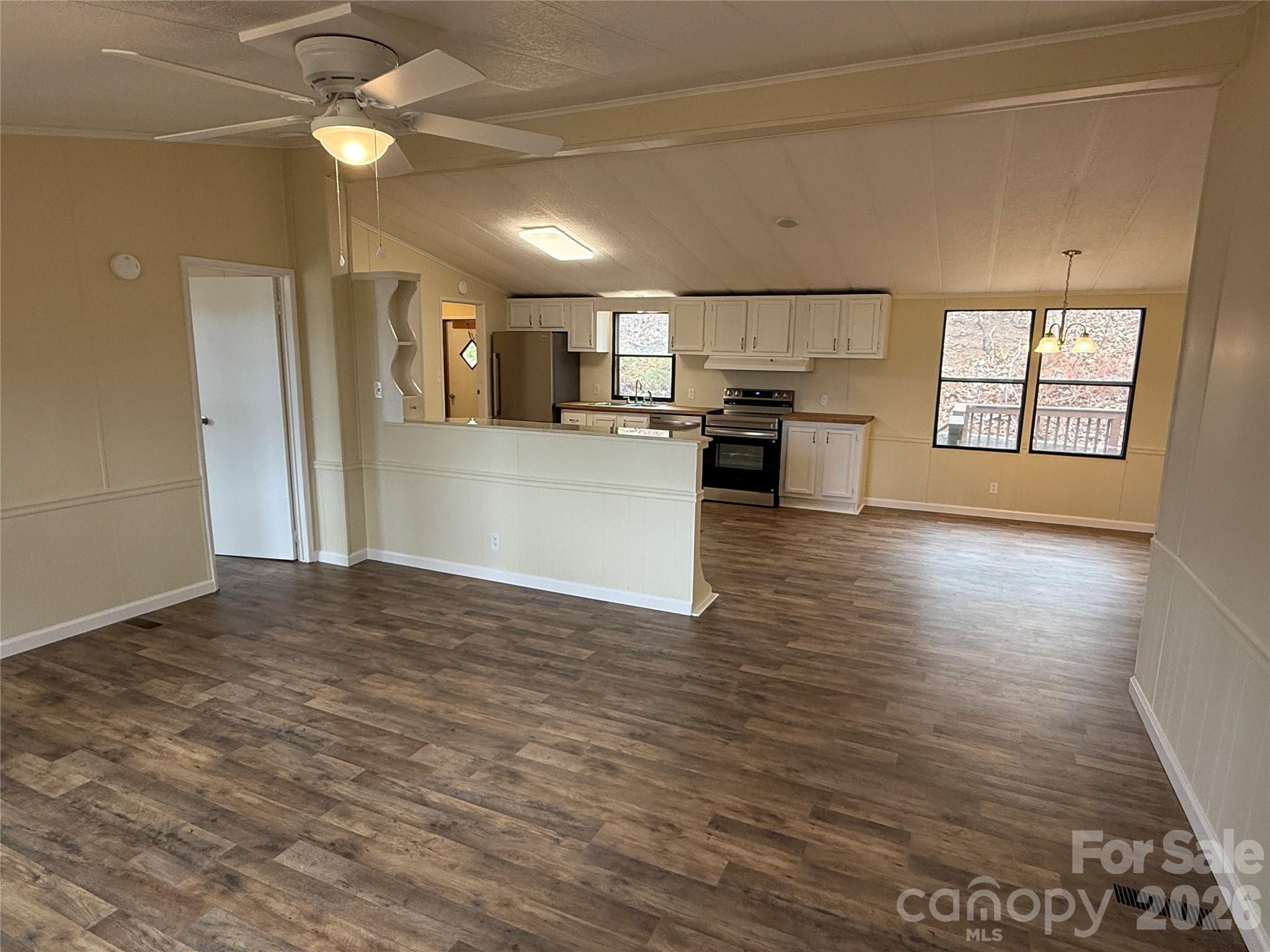 7686 Shoupes Grove Church Road Hickory, NC 28602 - Photo 11 of 36 a view of a kitchen with a sink and a window