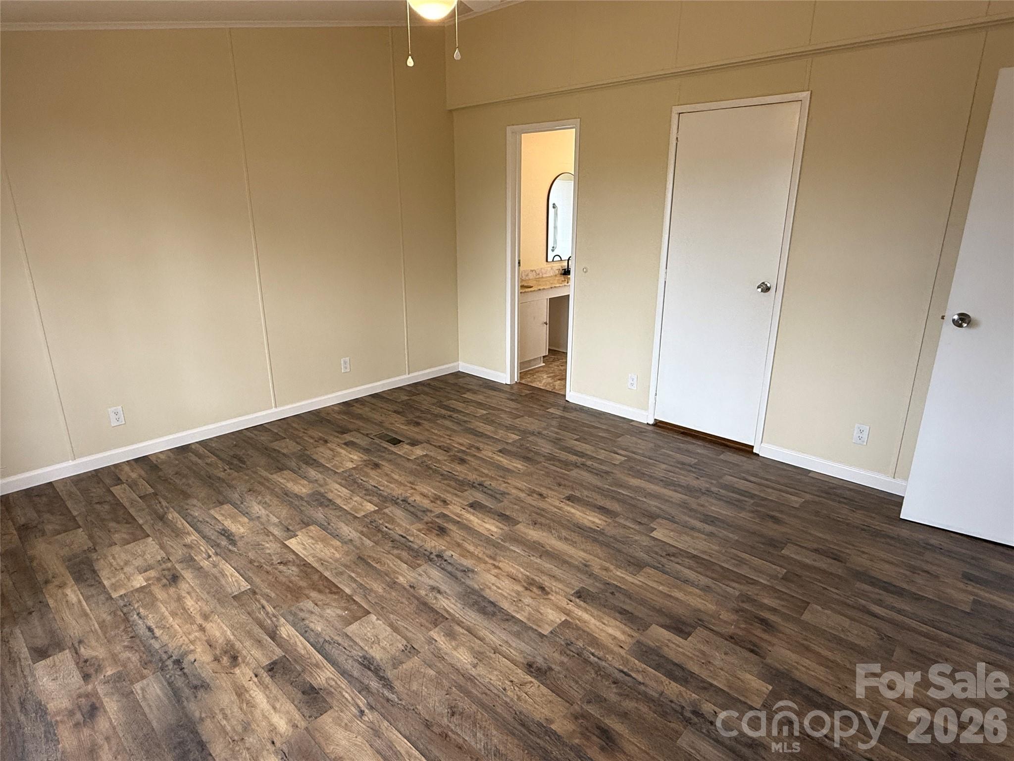 7686 Shoupes Grove Church Road Hickory, NC 28602 - Photo 12 of 36 a view of empty room with wooden floor