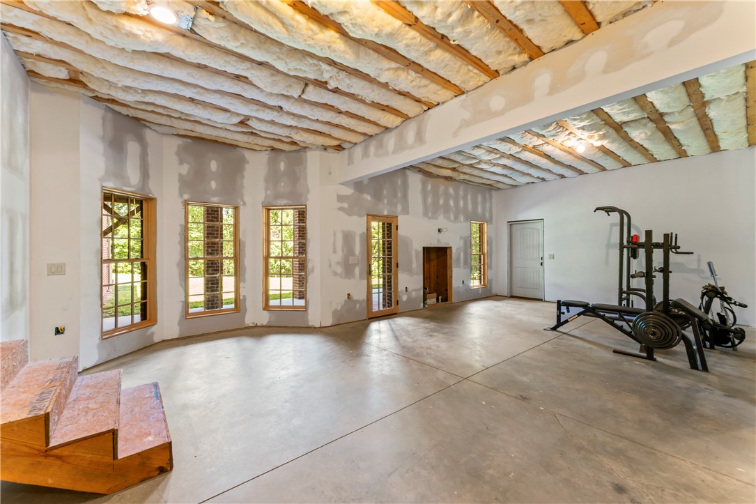 579 Terrapin Crossing Road Pickens, SC 29671 - Photo 36 of 50 Unfinished walkout basement space offers a versatile light filled layout, ready for your custom design with 10 ft ceilings and sheetrock already installed.