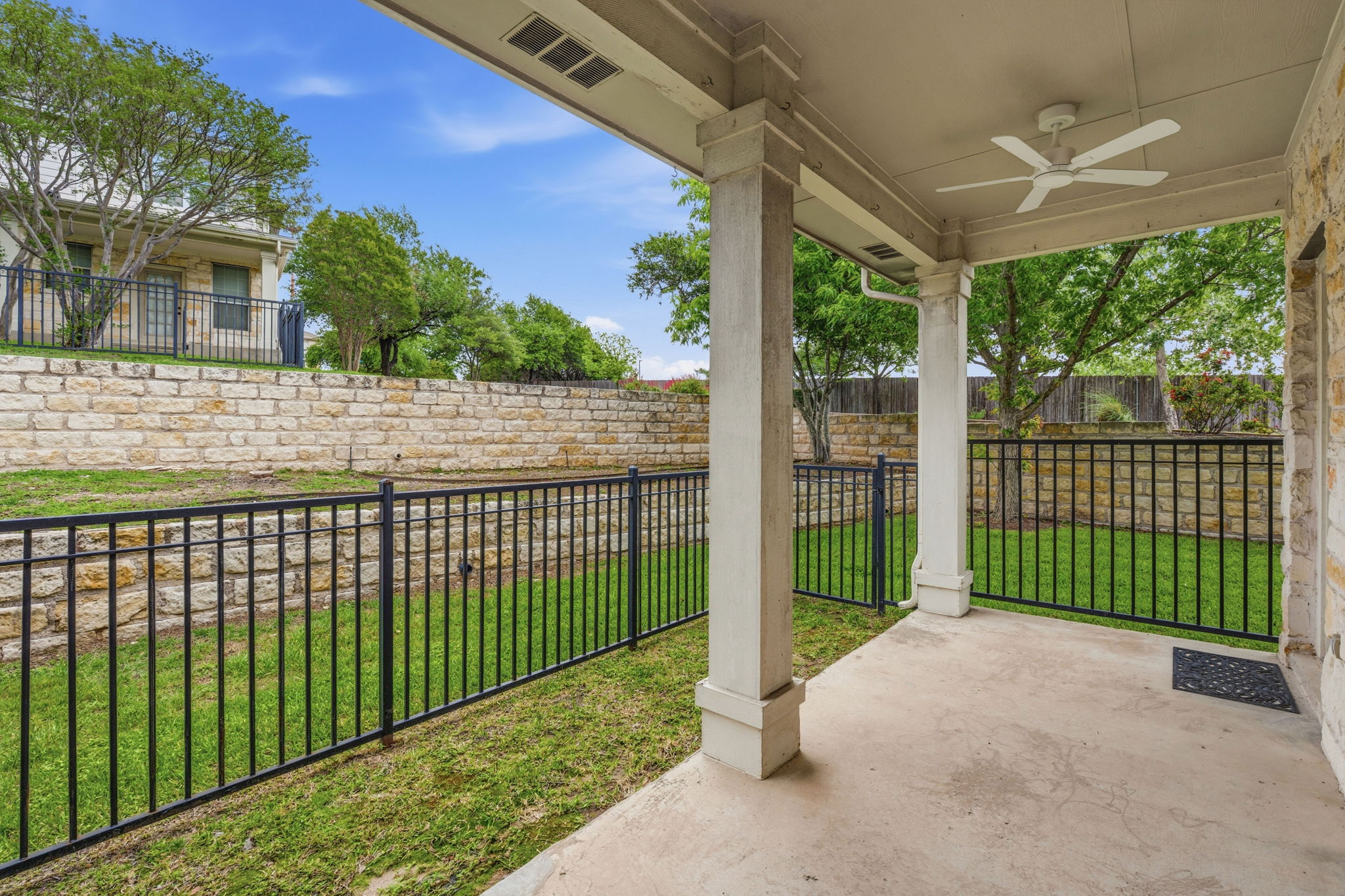 1900 Scofield Ridge Parkway, Unit 3002 Austin, TX 78727 - Photo 20 of 23 a view of a backyard with a large tree