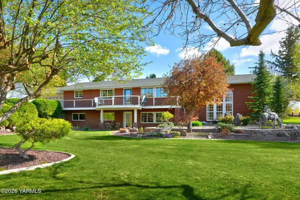 a front view of a building with garden