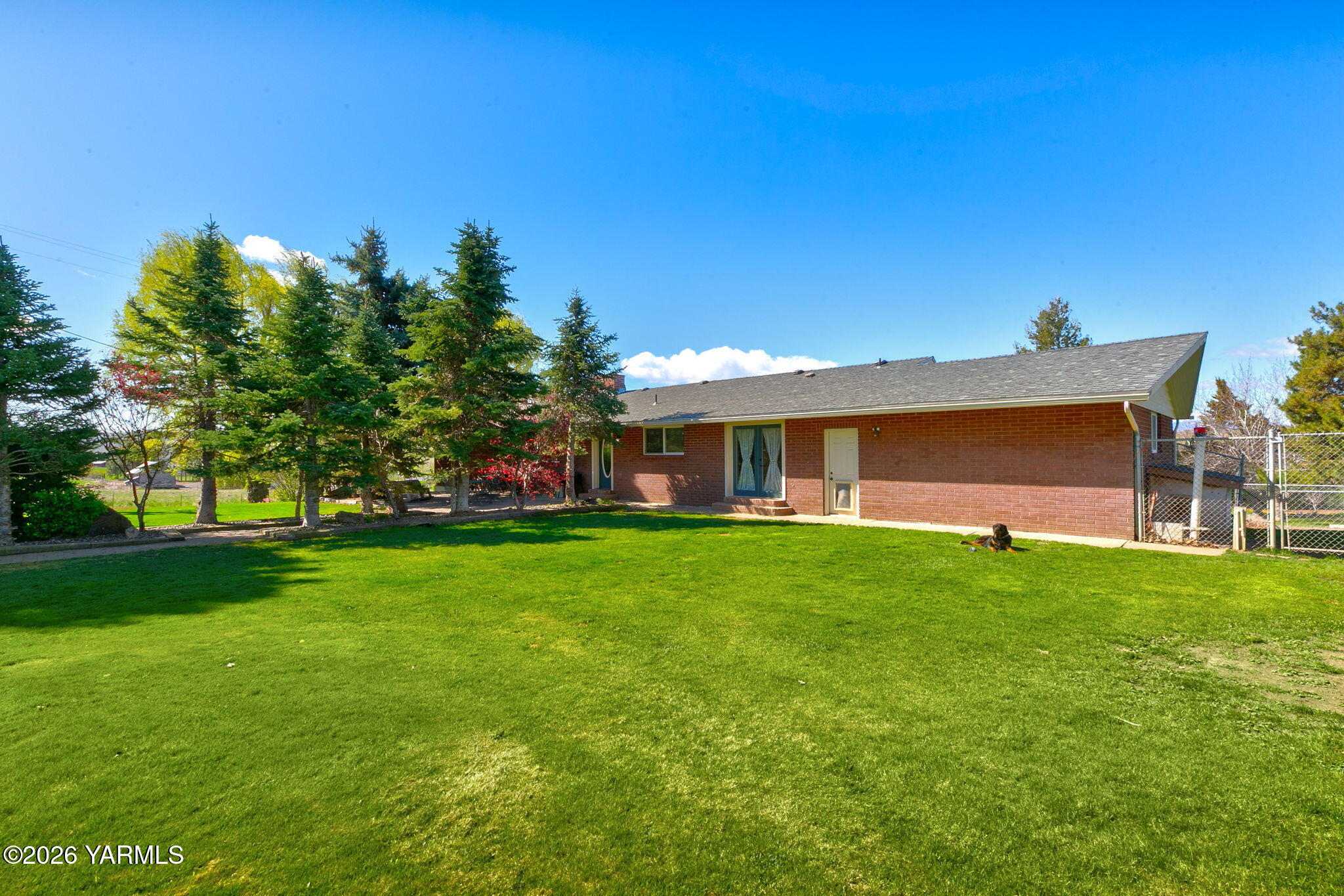 10161 North Wenas Road Selah, WA 98942 - Photo 44 of 48 a view of a house with a yard
