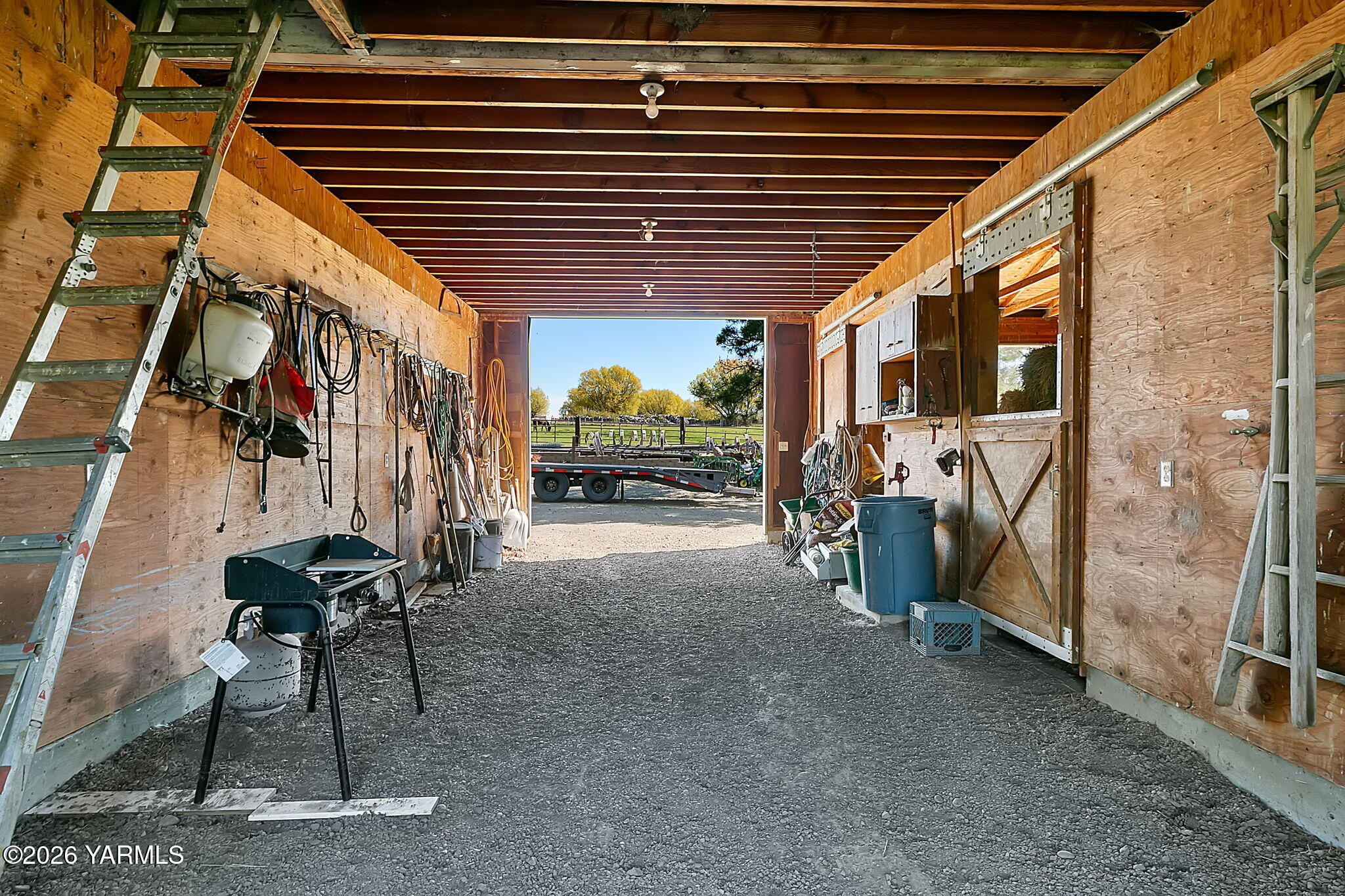 10161 North Wenas Road Selah, WA 98942 - Photo 7 of 48 a view of a porch with furniture and a parking