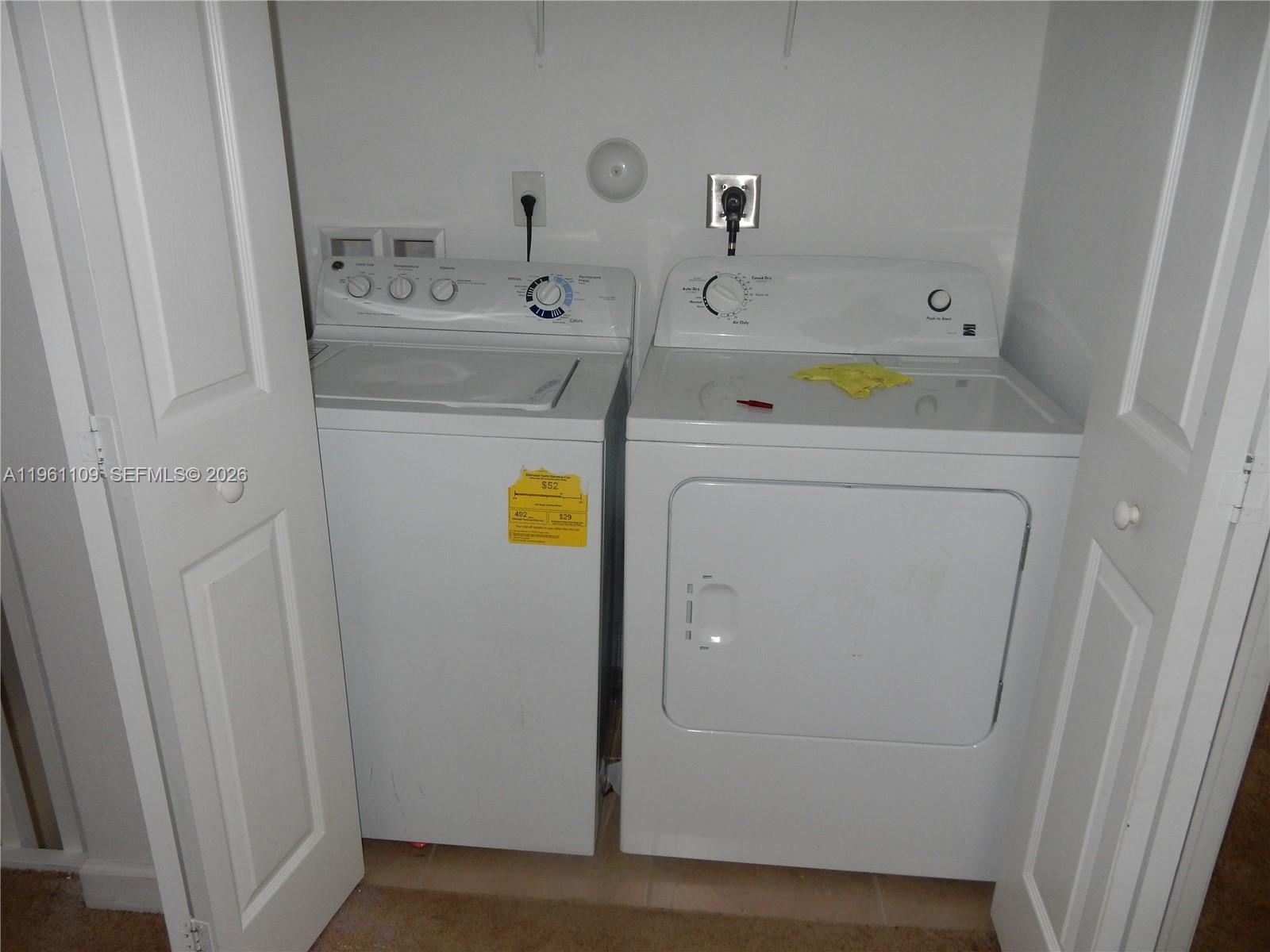 3467 West 89th Terrace Hialeah, FL 33018 - Photo 16 of 33 a utility room with dryer and washer