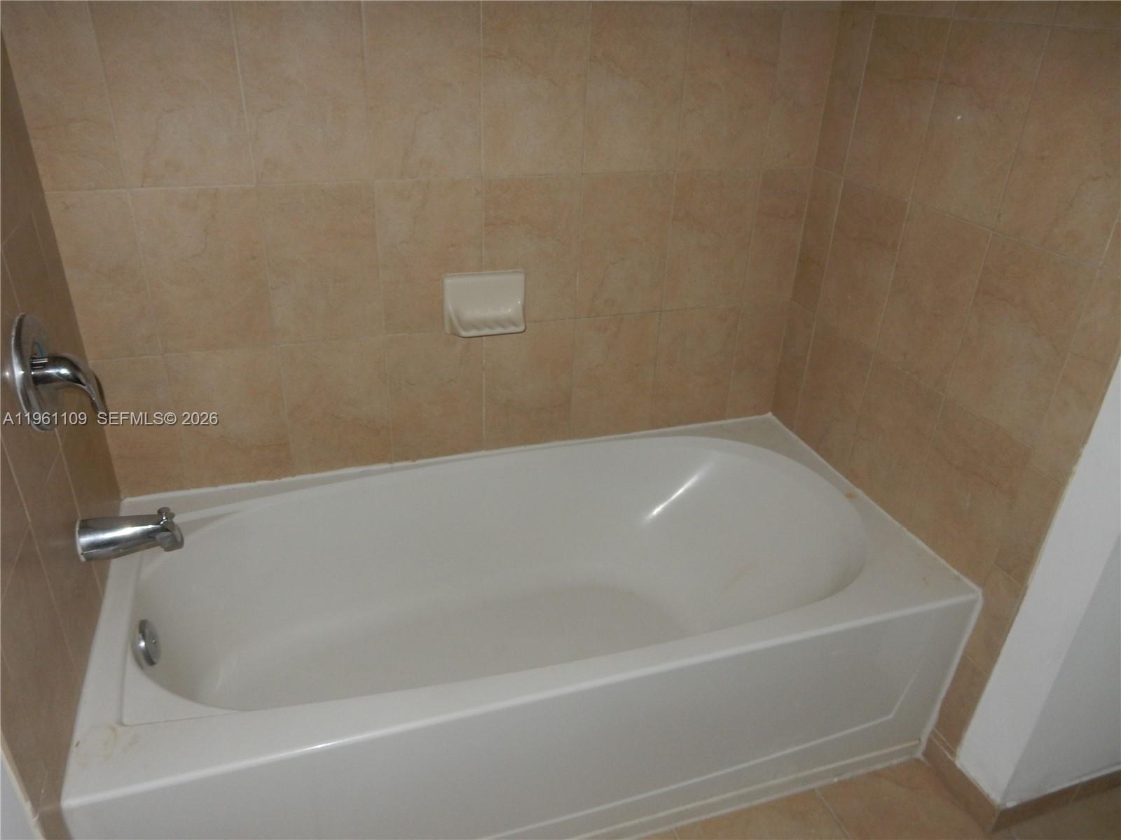 3467 West 89th Terrace Hialeah, FL 33018 - Photo 18 of 33 a bathroom with a bathtub