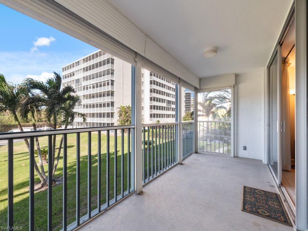 3 Bluebill Avenue, Unit 206 Naples, FL 34108 - Photo 13 of 19 a view of a balcony