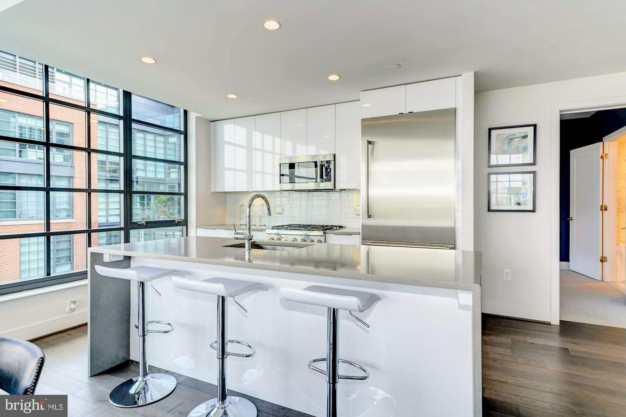 45 Sutton Square Southwest, Unit 1120 Washington, DC 20024 - Photo 13 of 39 Sleek high-end European-style kitchen