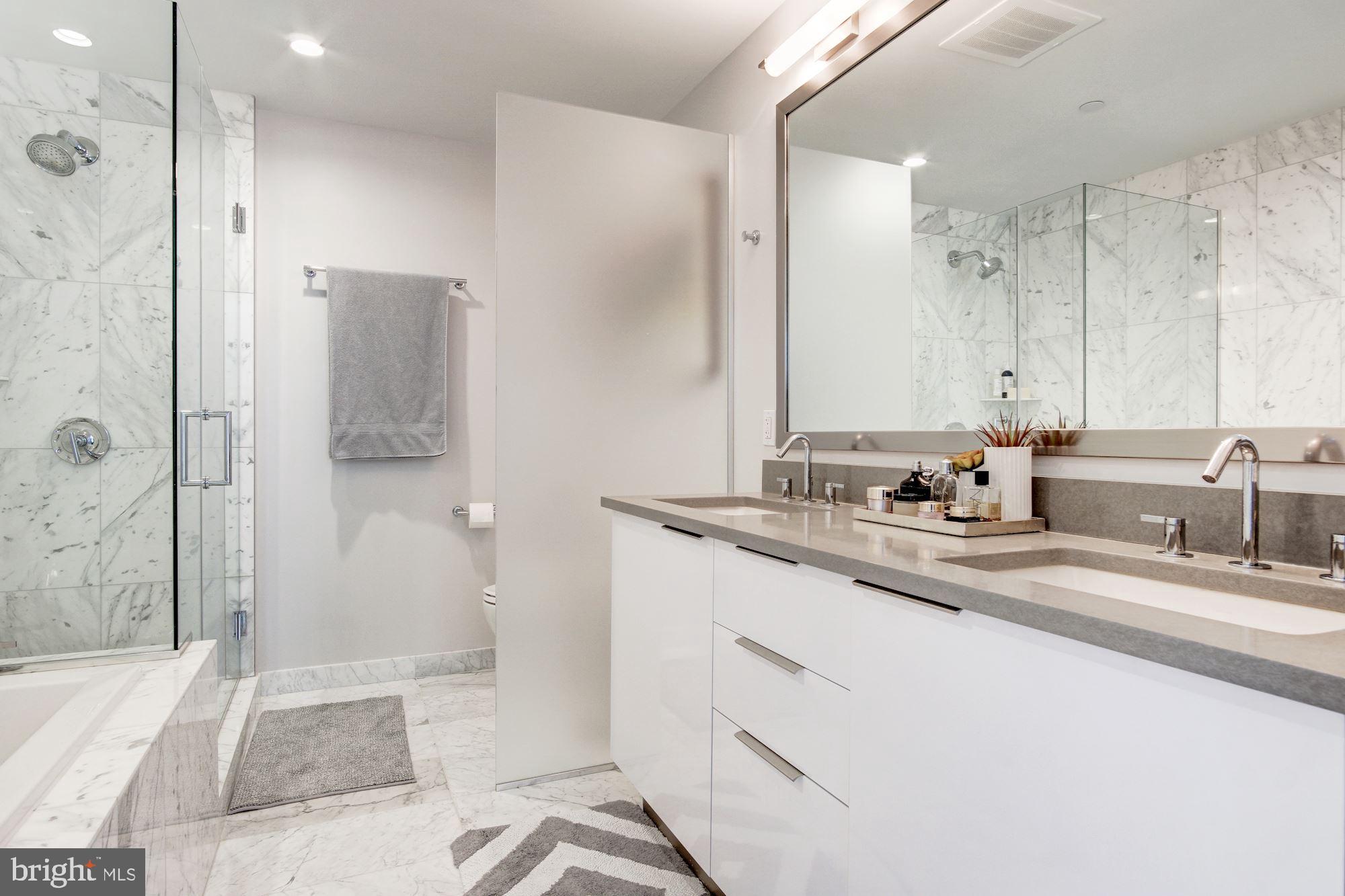 45 Sutton Square Southwest, Unit 1120 Washington, DC 20024 - Photo 17 of 39 Well-appointed spa-inspired ensuite master bath