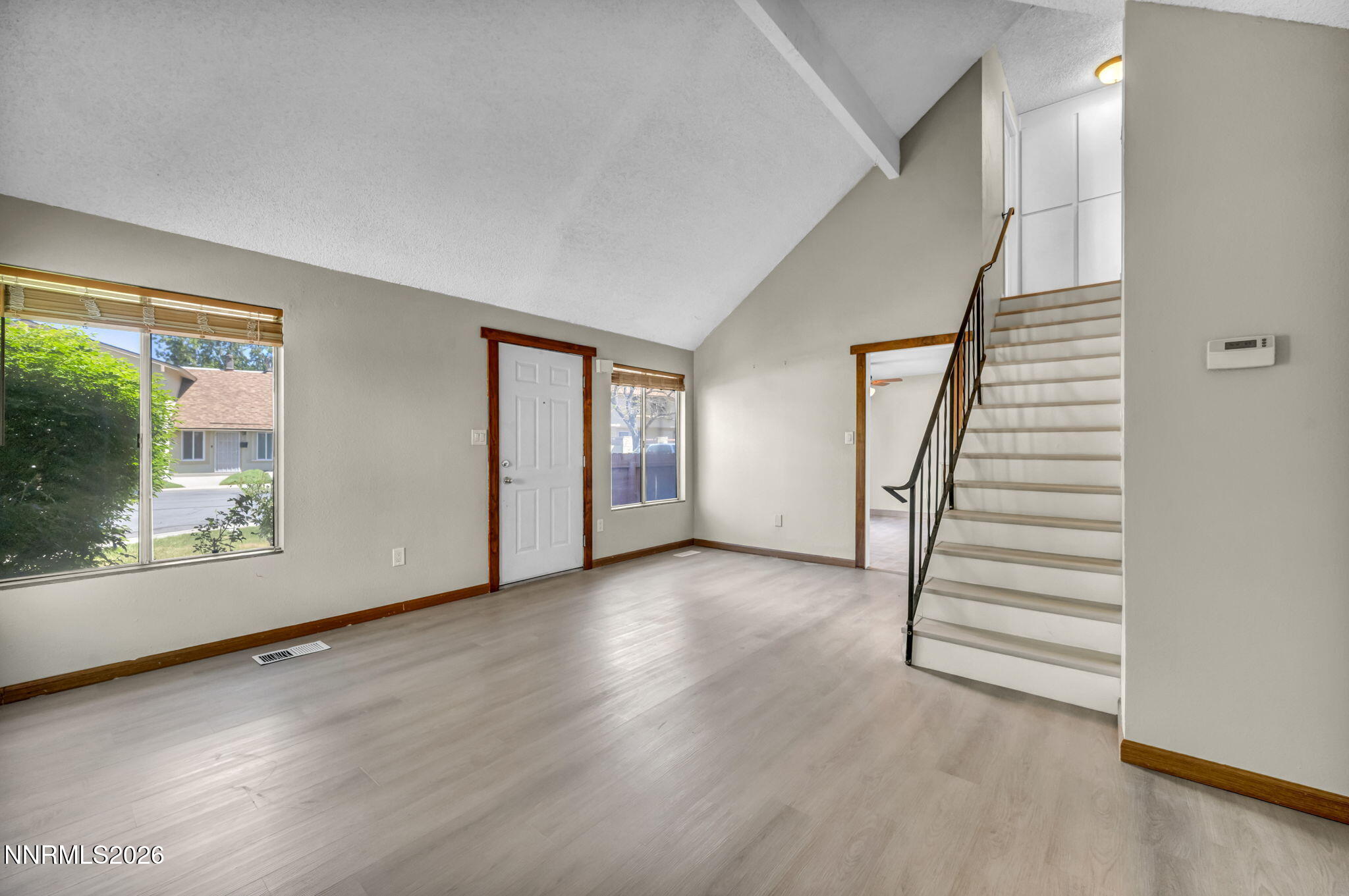 19 Condor Circle Carson City, NV 89701 - Photo 15 of 41 an empty room with wooden floor and windows