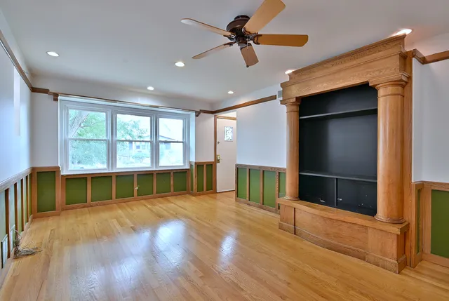 a kitchen with cabinets and stainless steel appliances