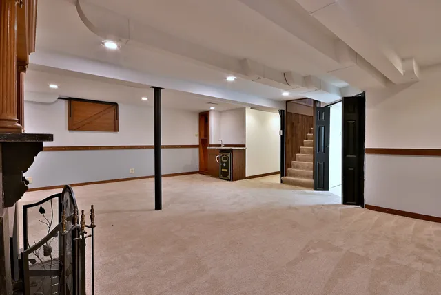 a view of a livingroom with an empty space and a couch