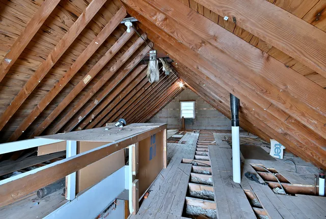 a view of outdoor space with wooden floor and iron stairs