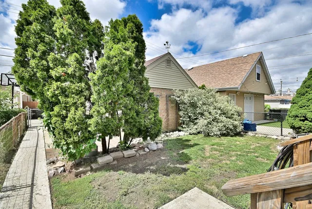 a house view with a garden space
