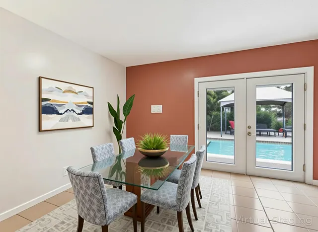 a dining room with furniture and window