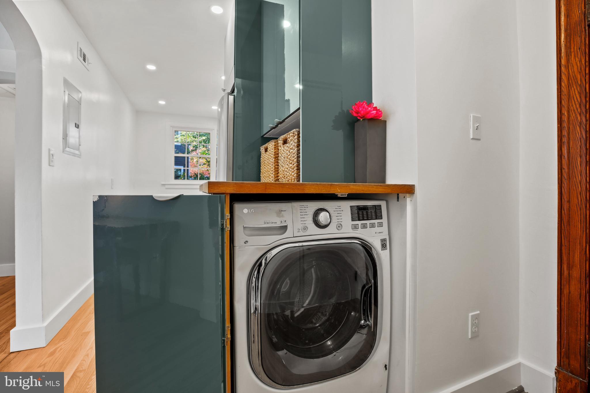318 Rhode Island Avenue Northeast, Unit 101 Washington, DC 20002 - Photo 15 of 33 a utility room with dryer and washer