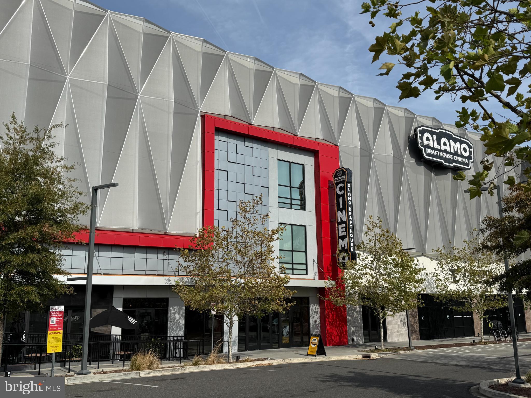 318 Rhode Island Avenue Northeast, Unit 101 Washington, DC 20002 - Photo 28 of 33 a front view of multi story residential apartment building with retail shop