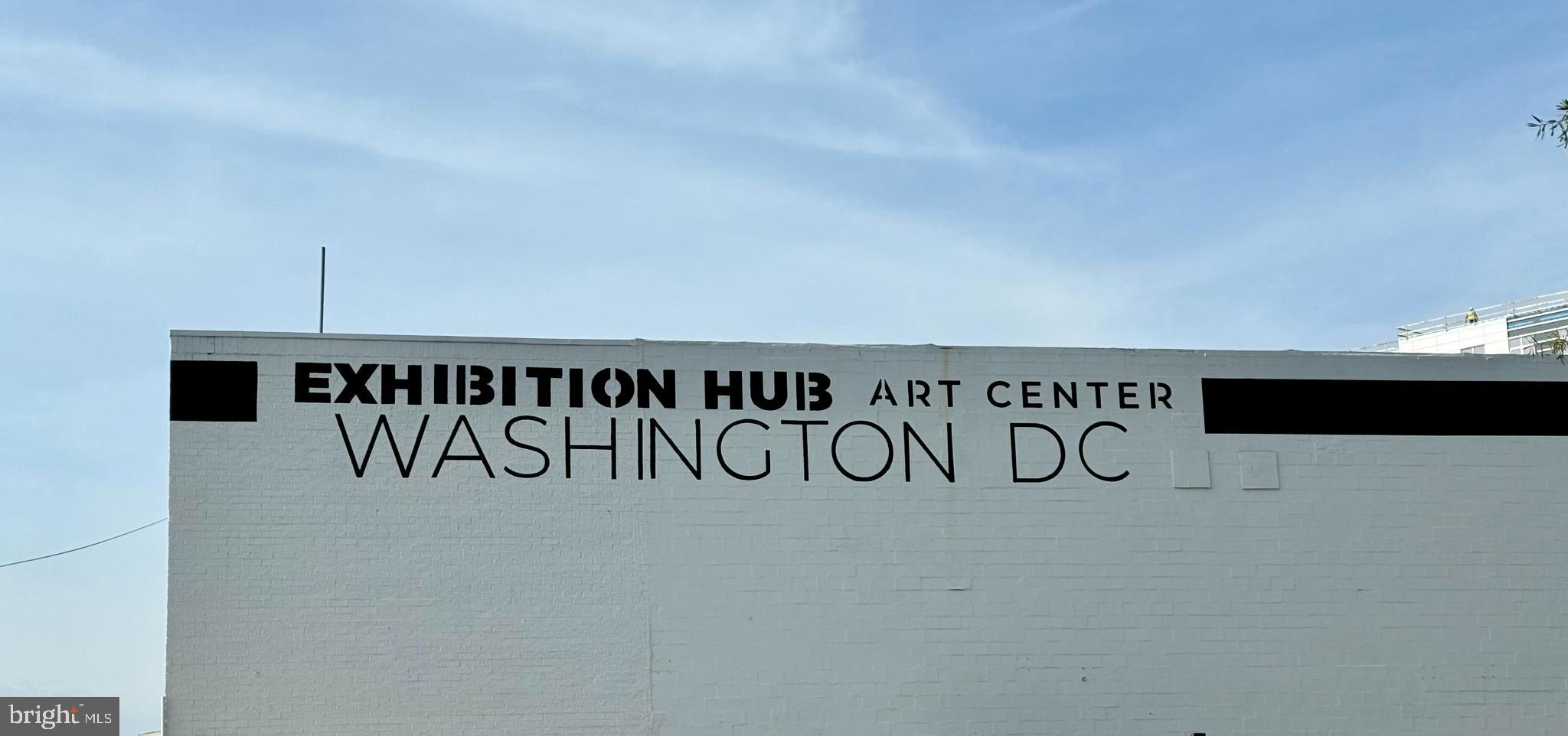 318 Rhode Island Avenue Northeast, Unit 101 Washington, DC 20002 - Photo 29 of 33 a street sign with a book shelf