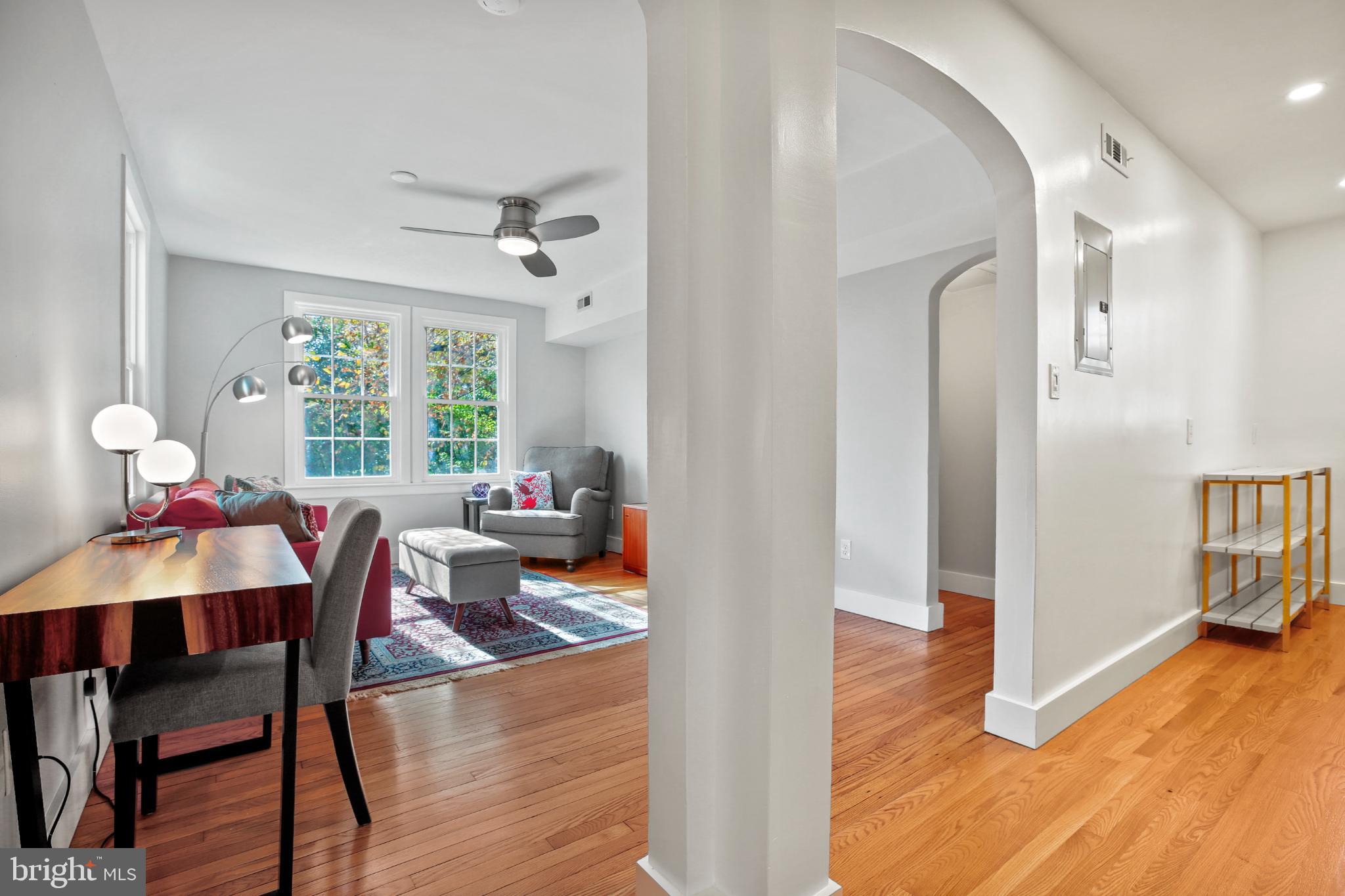 318 Rhode Island Avenue Northeast, Unit 101 Washington, DC 20002 - Photo 6 of 33 a view of a dining room with furniture window and wooden floor