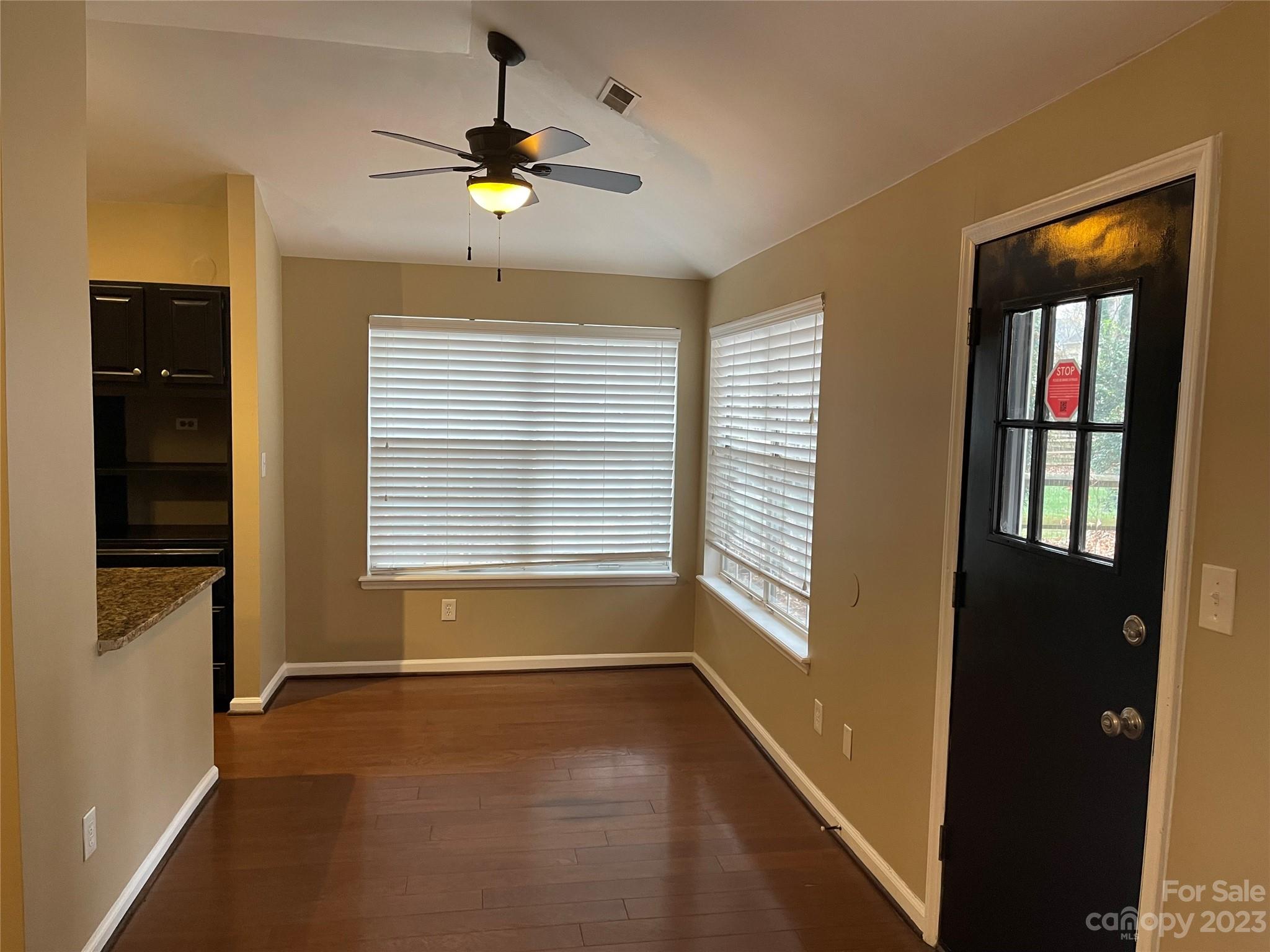 10427 Fairway Ridge Road Charlotte, NC 28277 - Photo 6 of 21 a view of an empty room with a window