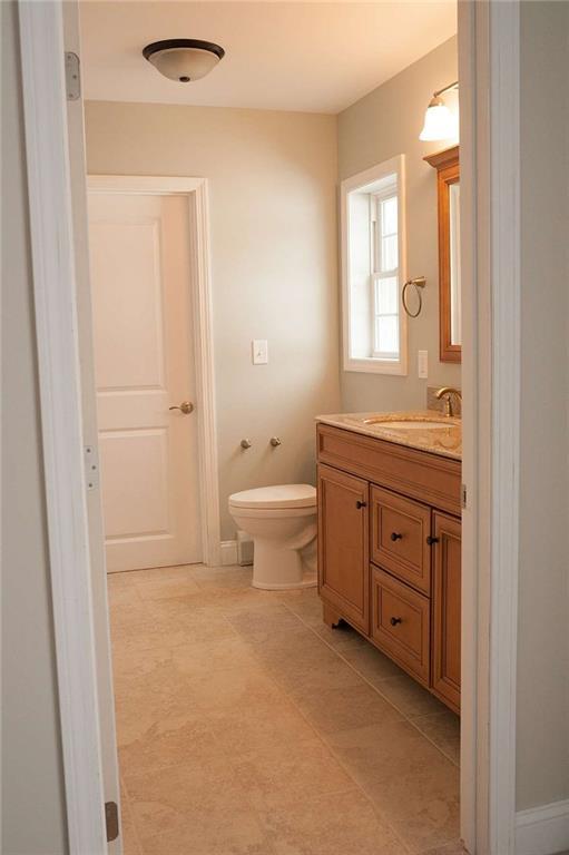 28 Chipmunk Lane Naples, ME 04055 - Photo 12 of 18 Master bath, showing walk -in closet...