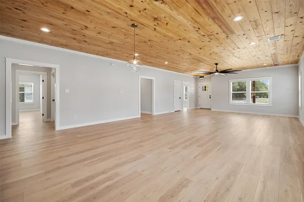 a view of a livingroom with wooden floor