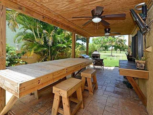 720 Mockingbird Lane Plantation, FL 33324 - Photo 9 of 12 a outdoor space with furniture