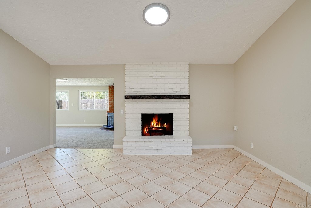 225 Hypoint Place Escondido, CA 92027 - Photo 16 of 63 a view of a livingroom with a fireplace